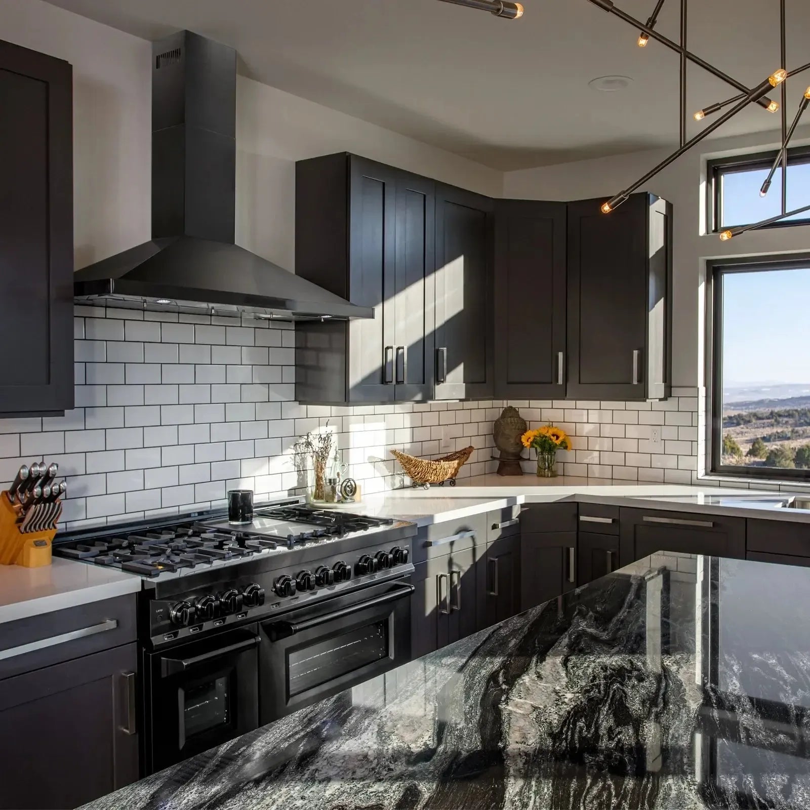 ZLINE 48" Convertible Wall Mount Range Hood in Black Stainless Steel with Set of 2 Charcoal Filters, LED lighting and Dishwasher-Safe Baffle Filters - BSKBN-CF-48 - The Home Selection